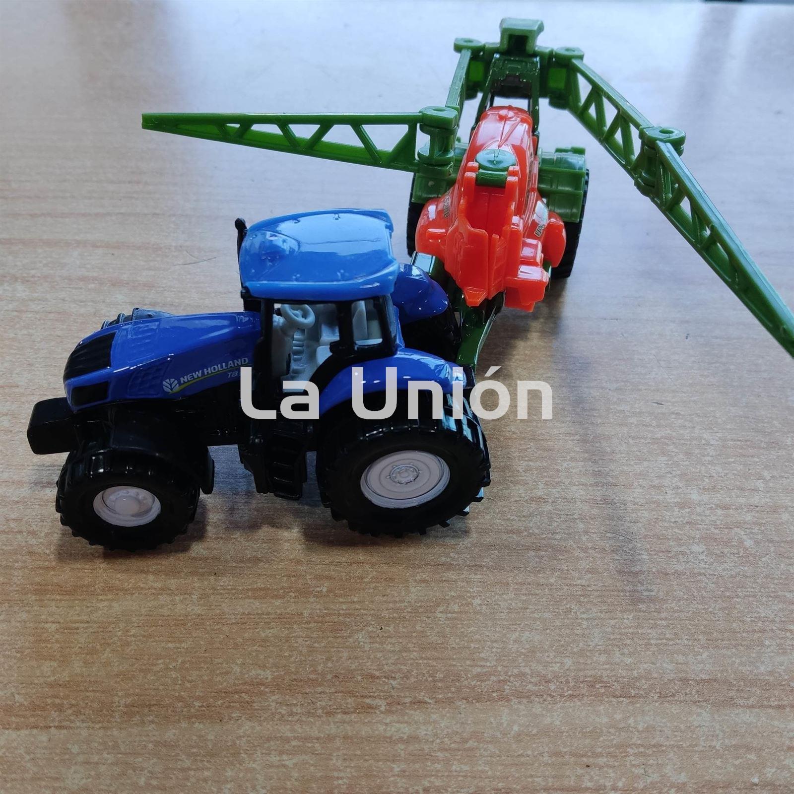 Tractor new Holland con remolque jueguete - Imagen 1