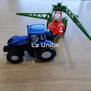 Tractor new Holland con remolque jueguete - Imagen 1